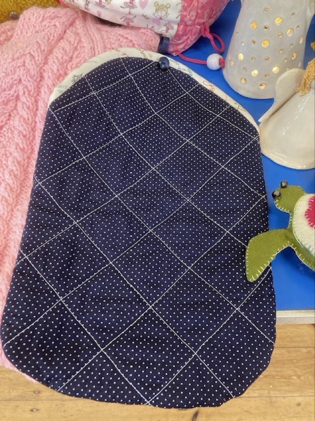 Hot water bottle cover made by Jenny Cr